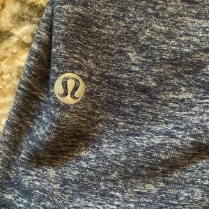 Lulu lemon , tight fit quarter zip up size 2.. not sold anymore i don’t think